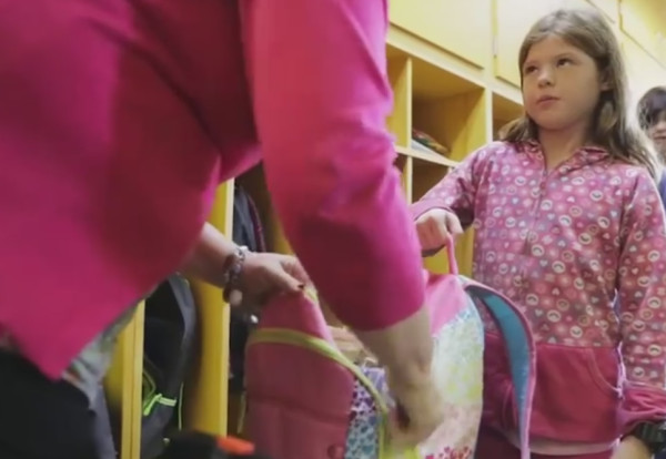 Girl Receiving BackSack